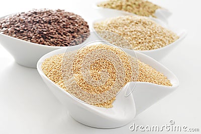 Amaranth, brown flax, quinoa and buckwheat seeds Stock Photo