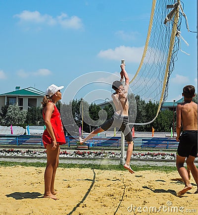 Amateur beach volleyball competition in the children's recreation camp in Anapa in Krasnodar region of Russia. Editorial Stock Photo