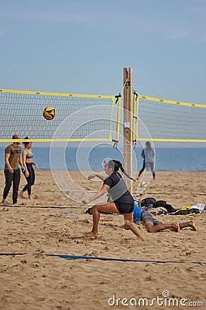 Amateur beach volleyball by the sea Editorial Stock Photo