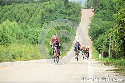 Amateur bike athletes make the most of their efforts in the Bicycle race Charity Trip Editorial Stock Photo