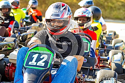 Amateur go-kart racers at a local track day Editorial Stock Photo