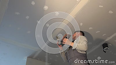 Amateur Man Apply Joint Compound Between Drywall Panels