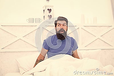 amazed bearded man hipster surprised about morning erection, mens health concept Stock Photo