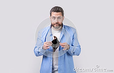 amazed moneyless guy with wallet at hand. photo of moneyless guy with wallet. Stock Photo