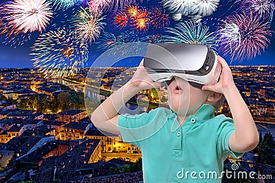 Amazed teen boy wearing virtual reality goggles watching movies or playing video games, on white. Surprised teenager Stock Photo