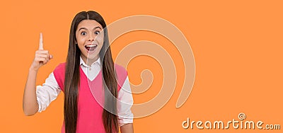 amazed teen school girl with long hair inspired with idea on yellow background, idea Stock Photo