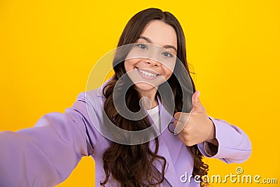 Amazed teenager making selfie. Tenn girl in casual look. Happy teenager, positive and smiling emotions of teen girl. Stock Photo