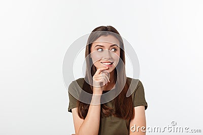 Amazement - woman excited looking to the side. Surprised happy young woman looking sideways in excitement. Mixed race Stock Photo