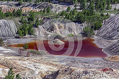 Amazing apocalyptic landscape like a planet Mars surface. Solidified red-brown black Earth surface. Barren, cracked and scorched Stock Photo