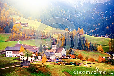 Colorful autumn scenery in Santa Maddalena village at sunrise. Dolomite Alps, South Tyrol, Italy. Stock Photo