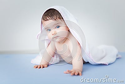 Amazing baby girl after bath in consideration. Stock Photo