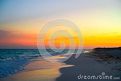 Amazing beautiful sunset on an exotic caribbean beach Stock Photo