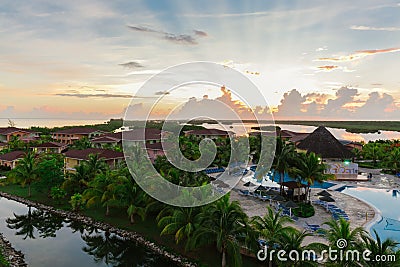 Amazing beautiful view of Memories Carib resort grounds, buildings and tropical garden on early morning sunrise time Editorial Stock Photo