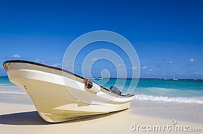 Amazing boat on sandy tropical beach Stock Photo