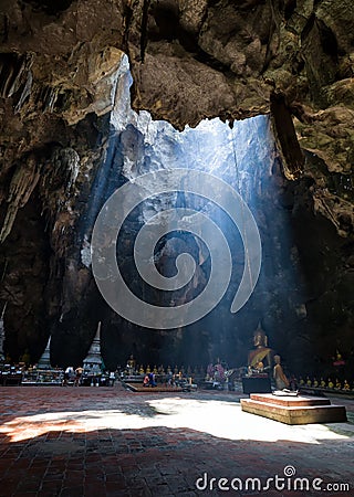 Amazing Buddhism with the ray of light in the cave, Ratchaburi P Editorial Stock Photo