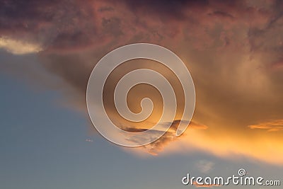 Amazing colored cloudy sky at sunset, artistic and mystical background Stock Photo