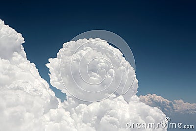 Amazing cumulus cloud formation in dark blue sky Stock Photo