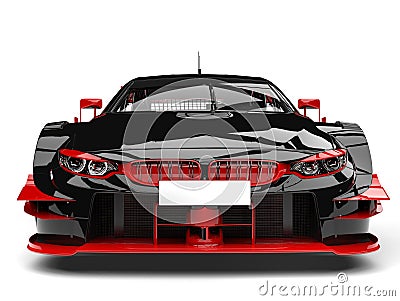 Amazing dark race car with red details - front view closeup shot Stock Photo