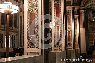 Intricate detail in artwork created from mosaic tiles, on large columns, Cathedral Basilica, St Louis, MO, 2019 Editorial Stock Photo