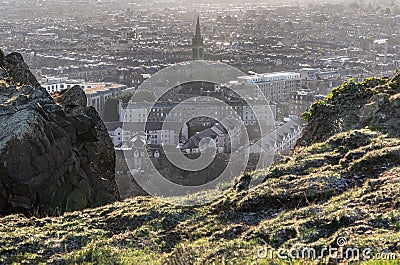 Amazing Edinburgh Cityscape and Edinburgh Castle seen from the top of Salisbury Crags Stock Photo