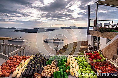 Amazing evening view of Fira, caldera, volcano of Santorini, Greece with cruise ships at sunset. Stock Photo