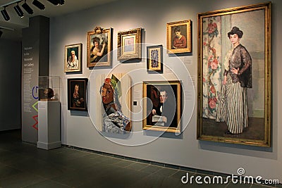 Several painted portraits, meticulously framed and hung on walls inside Memorial Art Gallery, Rochester, New York, 2017 Editorial Stock Photo