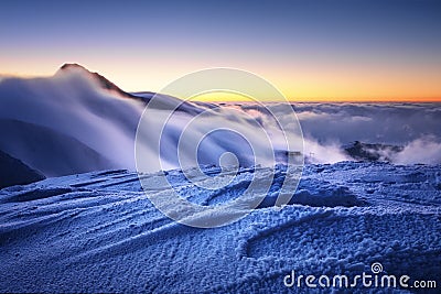 Amazing foggy sunset at mountain peak in Mala Fatra, Slovakia Stock Photo