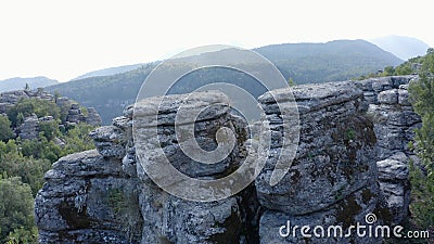 Amazing geological formations and green mountain valley on a summer day. Stock Photo