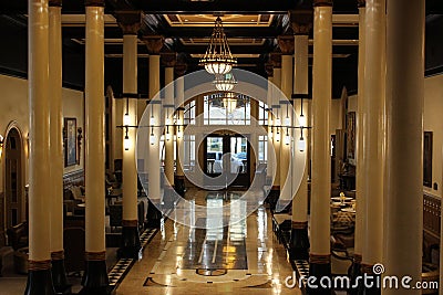 Amazing interior of historic hotel, with tall columns and intricate detail in lighting fixtures, The Driskill, Texas, 2018 Editorial Stock Photo