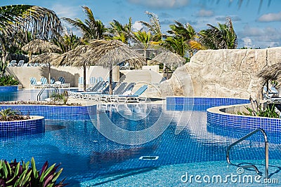 Amazing inviting view of tropical swimming pool Stock Photo