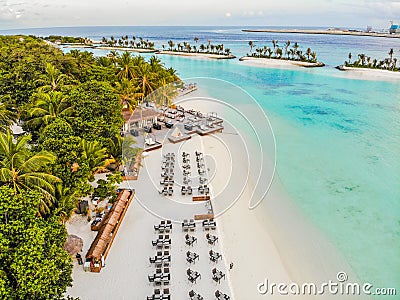 Amazing island in the Maldives ,Beautiful turquoise waters and white sandy beach with blue sky background Stock Photo