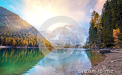 Amazing magical fairy autumn landscapeon the lake at sunrise Stock Photo