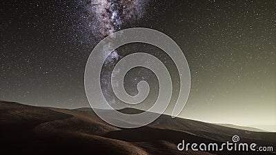 Amazing milky way over the dunes Erg Chebbi in the Sahara desert Stock Photo