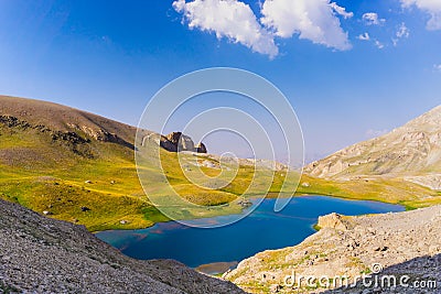 Amazing mountain lake between Bolkar Mountain and Taurus Mountain. Panoramic view of black lake. Nigde, Turkey. Volcanic crater. Stock Photo