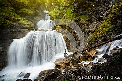 Amazing mountain waterfall near Farchant village at Garmisch Partenkirchen, Farchant, Bavaria, Germany. Stock Photo
