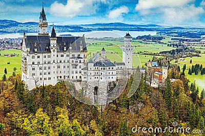 Amazing Neuschwanstein castle autumn view from the viewpoint on the bridge Stock Photo