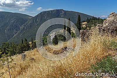 Amazing Panorama of Amphitheatre in Ancient Greek archaeological site of Delphi, Greece Stock Photo