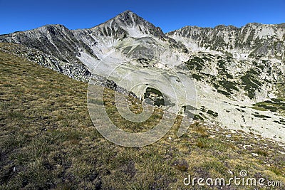 Amazing panorama of Polezhan peak, Pirin Mountain Stock Photo