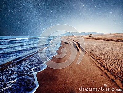 Amazing Panoramic Landscape view of a Milky Way at night sky, with grain Stock Photo