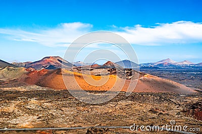 Amazing panoramic landscape of volcano craters in Timanfaya national park. Popular touristic attraction in Lanzarote island, Stock Photo