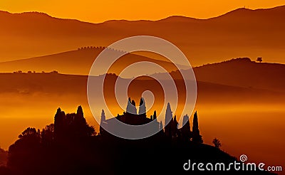 Amazing panoramic photo of the golden hour in Podere Belvedere, Tuscany, Italy Stock Photo