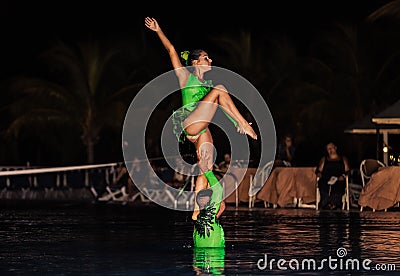 Amazing performance of hotel entertainment team at night beautiful water show Editorial Stock Photo