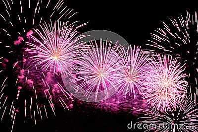 Amazing purple fireworks on black background Stock Photo