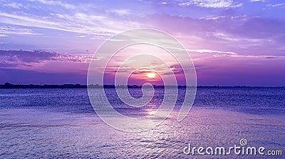 Amazing purple sky sunset over sea . dusk on adriatic sea. Stock Photo