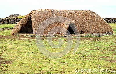Amazing reconstructed ancient upside-down boat shaped house on Easter Island called Hare Paenga, Chile Stock Photo