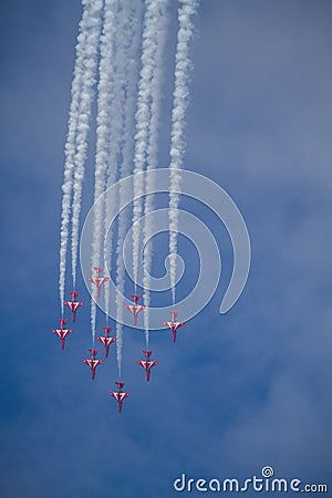 Red Arrows Diving Through The Sky Editorial Stock Photo
