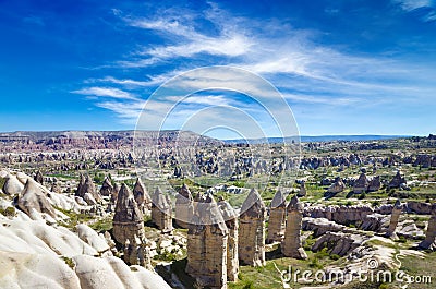 Amazing rocks in Cappadocia near Goreme eroded into spectacular pillars and minaret-like forms, Turkey Stock Photo
