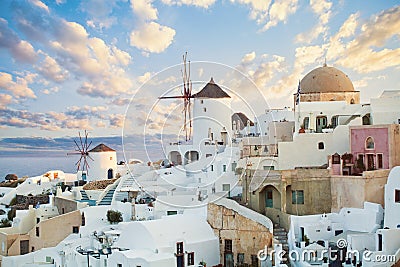 Amazing Santorini panorama. Beautiful Santorini landscape against sunrise sky with clouds Stock Photo