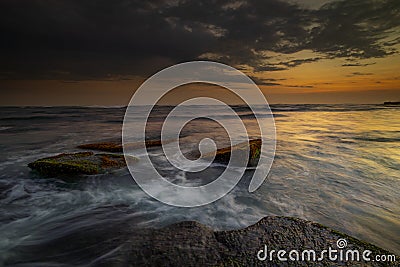 Amazing seascape with motion waves. Waterscape background. Moving water. Nature concept. Sunset scenery background. Long exposure Stock Photo