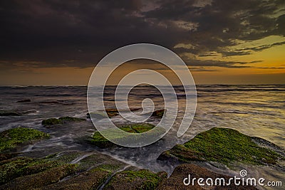 Amazing seascape with motion waves. Waterscape background. Moving water. Nature concept. Sunset scenery background. Long exposure Stock Photo